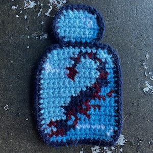 May include: A set of three ceramic mugs with a speckled, matte finish. The mugs are in shades of cream, light gray, and dark gray. Each mug has a simple, minimalist design, perfect for coffee or tea.