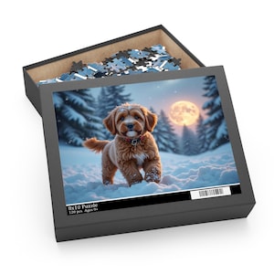 May include: A puzzle box with a winter scene featuring a brown puppy in the snow with a full moon. The box is black and contains puzzle pieces. The puzzle is 8x10 inches and has 120 pieces for ages 9+.