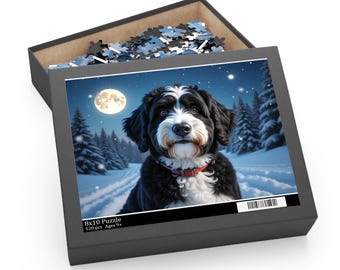 May include: A black puzzle box with a winter scene featuring a black and white dog with a red collar. The puzzle image shows a snowy landscape with a full moon and evergreen trees. The box reads "8x10 Puzzle 120 pcs Ages 9+".