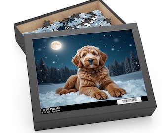 May include: An 8x10 inch puzzle featuring a golden-brown puppy lying in the snow under a full moon. The puzzle box is open, revealing the pieces. The image includes text that reads "8x10 Puzzle 120 pcs Ages 9+".