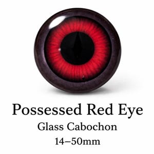 May include: A glass cabochon with a possessed red eye design. The eye has a black pupil and a vibrant red iris. The cabochon is available in sizes ranging from 1.4cm to 5cm.