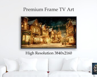May include: A framed digital art print featuring a snowy village scene at night. The image shows buildings with lit windows and a street with a dusting of snow. The text "Premium Frame TV Art" and "High Resolution 3840x2160" are displayed.