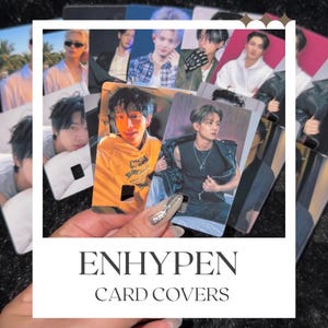 May include: A collection of rectangular card covers featuring photographic portraits of the K-pop group Enhypen. The covers display various members in different outfits and settings, with some featuring cut-out sections. The text ENHYPEN CARD COVERS is printed in black on a white background.