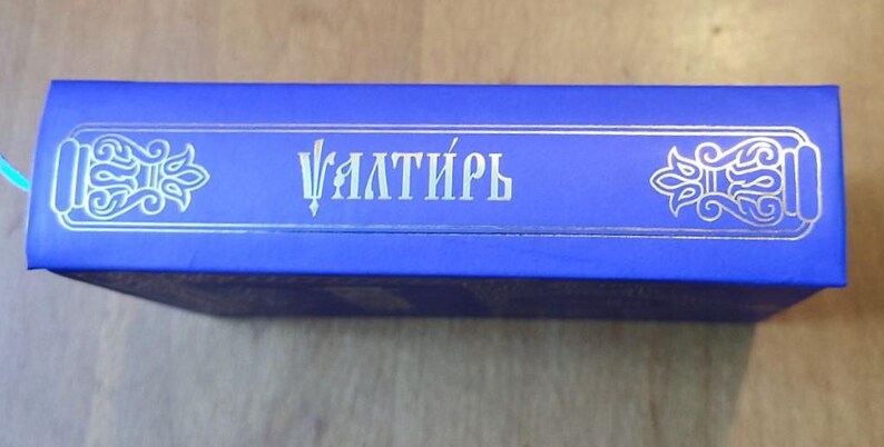 May include: A set of three ceramic mugs with a speckled, matte finish. The mugs are in shades of cream, light gray, and dark gray. Each mug has a simple, minimalist design and a rounded handle.