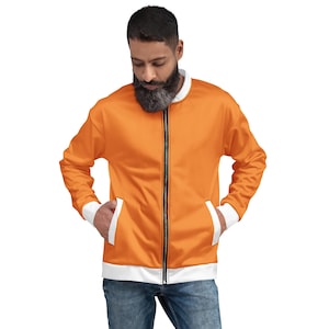 May include: Orange bomber jacket with a black zipper, white cuffs, and white trim on the pockets and bottom hem. The jacket is a solid orange color and has a classic bomber jacket design.