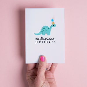 Dinosaur Birthday Card with pom pom hat