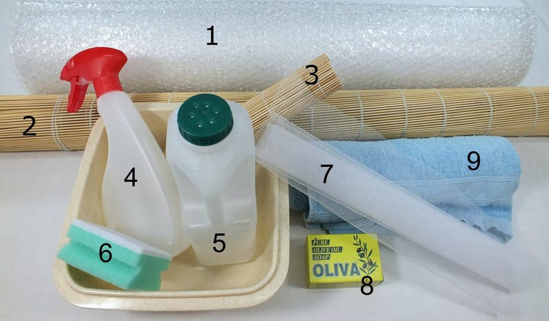 The photo shows the basic equipment you need to make wet felt.  Bubble wrap, rolling mat, netting, towel, soap, water sprinkler bottle, bowl, sponge