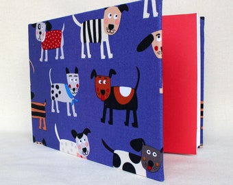 Handmade artists sketchbook with dogs.