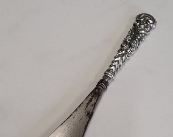 antique ornate silver handle shoehorn