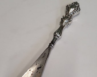 antique ornate silver handle shoehorn