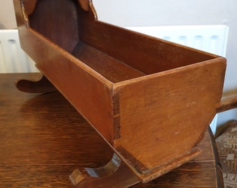 antique wooden bassinet