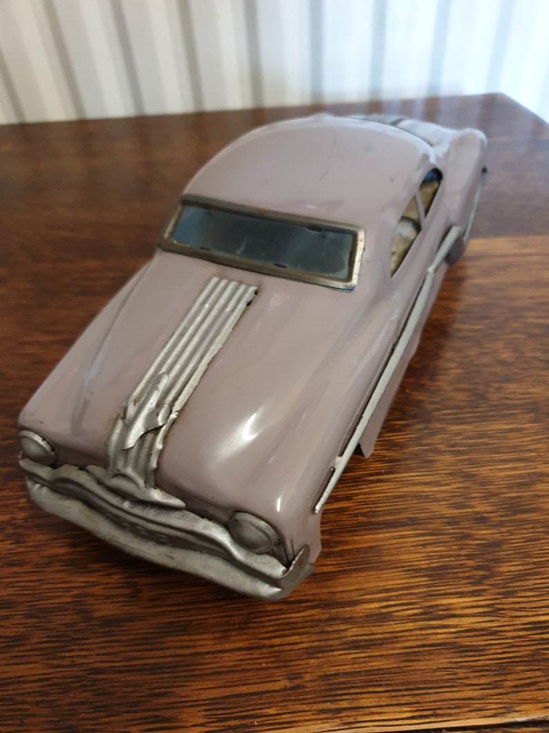 vintage minister delux tin toy car