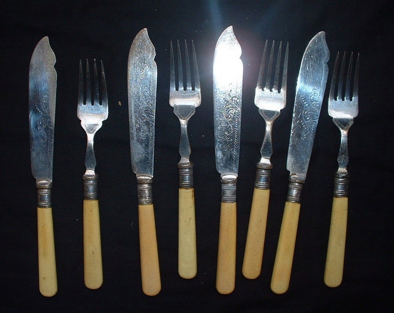 Antique set of 4 fish knives and forks Etsy
