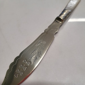 antique gold tone etched mother of pearl handle butter knife