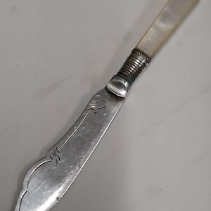 antique silver plate small size mother of pearl handle butter knife