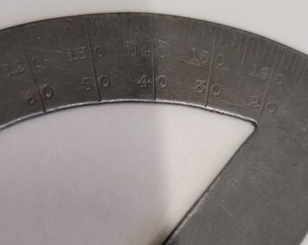 antique simple steel protractor