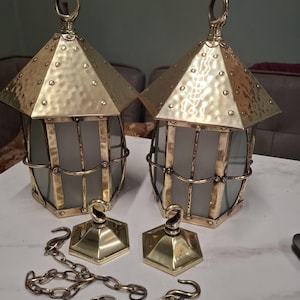 antique pair of arts and crafts brass hall lanterns