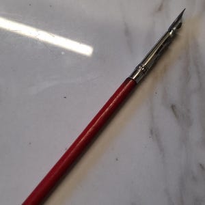 caneta de tinta vermelha vintage para madeira