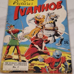 May include: Vintage comic book cover titled "Ivanhoe" with illustrations of medieval characters in action. The cover features a blue background with the title in large red letters and the text "Classic Pictures".