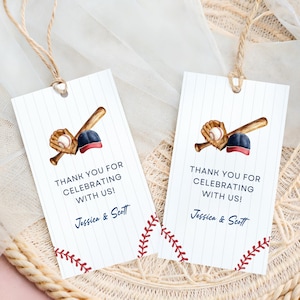 May include: Two baseball-themed gift tags with a watercolor illustration of a baseball glove, bat, and cap. The tags have vertical stripes and red stitching details. Text reads "THANK YOU FOR CELEBRATING WITH US!" and the names "Jessica & Scott".