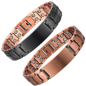 May include: Two copper magnetic bracelets. One is black and the other is copper-colored. Both bracelets have a rectangular plate in the center and are made of rectangular links with small, round, gray magnets. The bracelets are displayed on a white background.