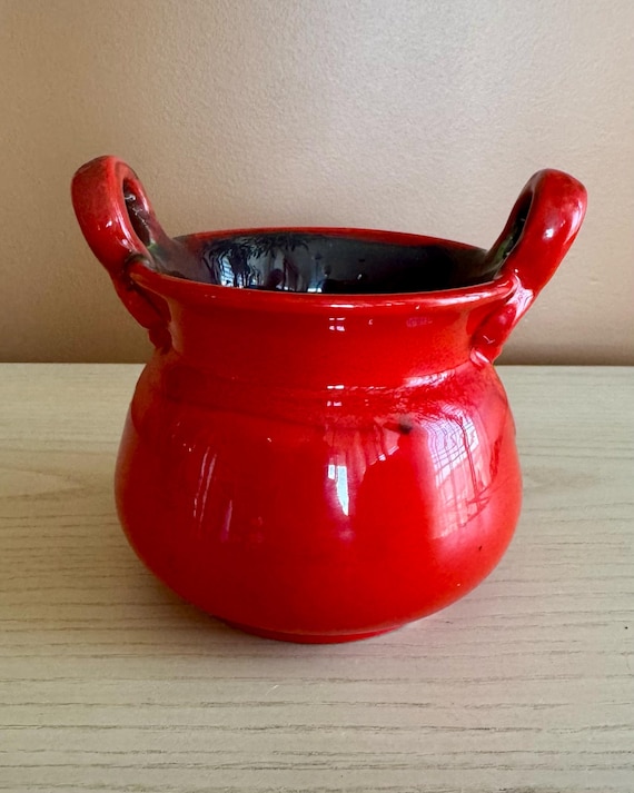 Handmade red studio pottery vessel – signed CAM – sculptural handles – modern ceramic décor