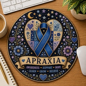 May include: A round mousepad featuring a central blue awareness ribbon over a heart-shaped patchwork design with floral patterns, stars, and a crescent moon. A banner displays the text APRAXIA, AWARENESS, SUPPORT, HOPE, LEARN, GROW, BELIEVE.