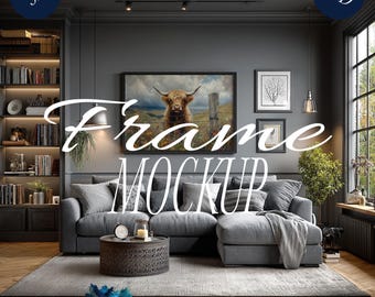 Puede incluir: Interior de salón con un sofá seccional gris, una mesa de centro redonda y una gran obra de arte enmarcada con una vaca de las Tierras Altas. La habitación tiene una paleta de colores neutros con pisos de madera y una ventana grande. El texto "Frame Mockup" está presente.