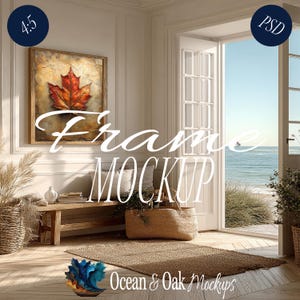 Puede incluir: Una obra de arte enmarcada con una vibrante hoja de arce naranja sobre un fondo texturizado. La escena incluye un banco de madera, una cesta tejida y una vista del océano. El texto "Frame Mockup" y "Ocean & Oak Mockups" son visibles.