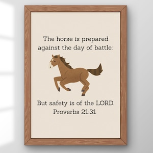 May include: A framed print featuring a brown cartoon horse illustration. The text reads, "The horse is prepared against the day of battle: But safety is of the LORD. Proverbs 21:31." The frame is made of wood.