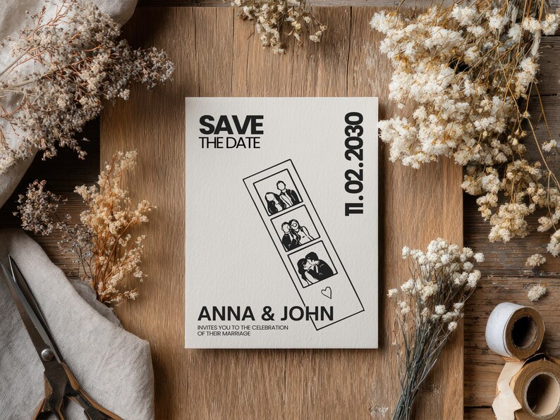 A cream-colored wedding invitation with the text "SAVE THE DATE" and "ANNA & JOHN" in black. The invitation features a photo strip with three images and the date "11.02.2030". The invitation is on a wooden surface with dried flowers.