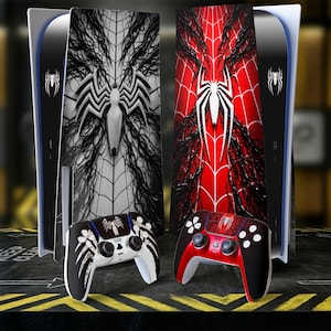 May include: Two PlayStation 5 consoles with Spider-Man themed faceplates and matching controllers. One console features a black and white design, the other a red and black design. The controllers have the Spider-Man logo.