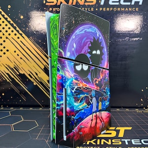 May include: A gaming console skin featuring a vibrant space-themed graphic with silhouettes of two characters against a purple planet. The design includes a green portal pattern on the side and colorful cosmic clouds, with the text SKINSTECH visible.