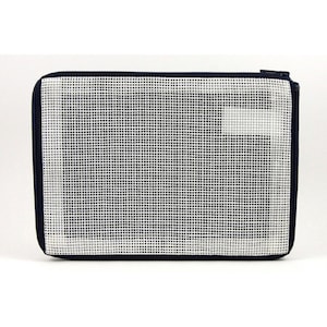 May include: A navy blue mesh zippered pouch with a white mesh interior. The pouch is ideal for organizing small items.