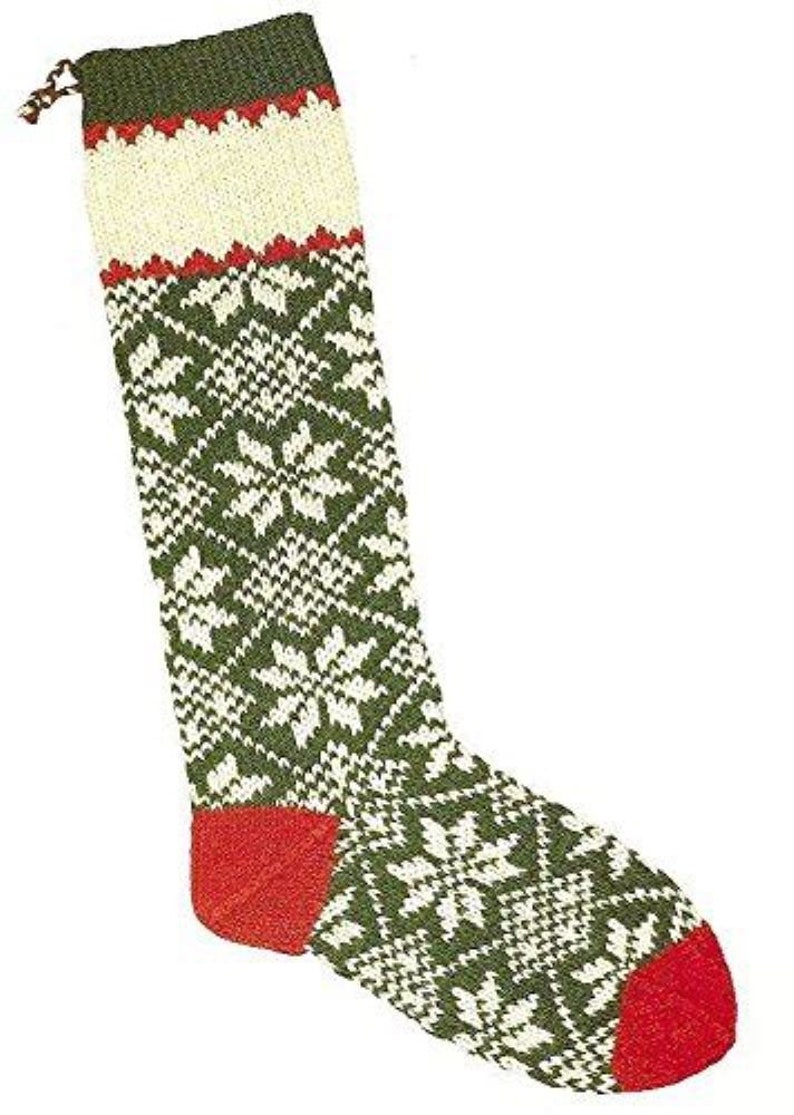 May include: A green, white, and red knitted Christmas stocking with a snowflake pattern.