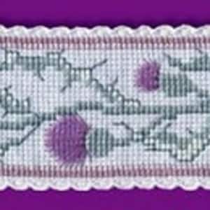 May include: A cross stitch bookmark kit featuring a design of a purple thistle plant with the text "Ancient Thistle Bookmark Kit" on the left side of the image.