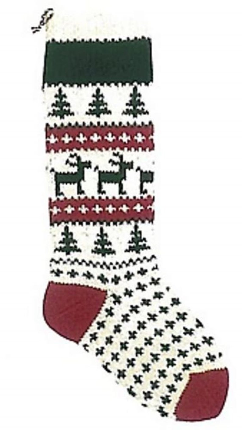 May include: A white knitted Christmas stocking with a green, red, and white pattern. The stocking features a reindeer design and a red cuff.