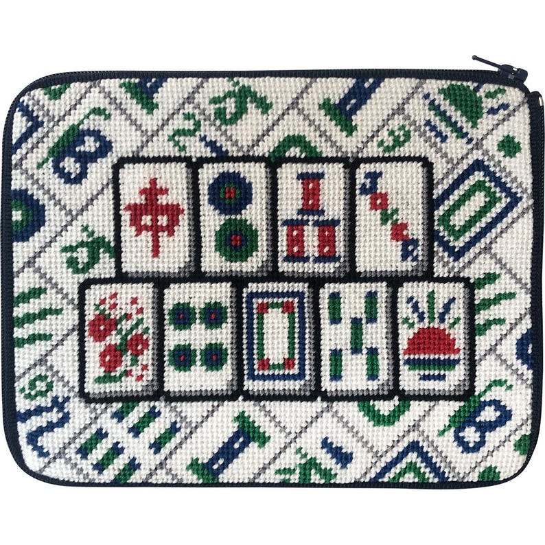 May include: A white canvas zippered pouch with a black border and a colorful embroidered design of mahjong tiles. The tiles feature various symbols and numbers.