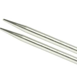 May include: A pair of silver knitting needles with gold tips.