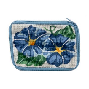 May include: A blue and white needlepoint zippered pouch with a design of blue morning glories with yellow centers and green leaves.