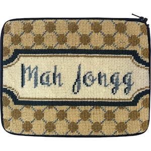 May include: A beige and brown needlepoint zippered pouch with a black border and the words "Mah Jongg" embroidered in blue and white.