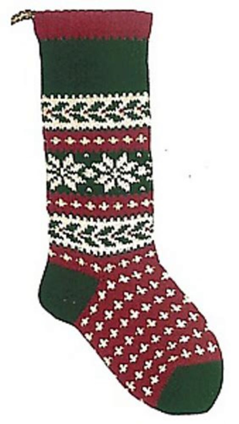May include: A red and green knitted Christmas stocking with a white snowflake pattern. The stocking has a green cuff and a green toe.