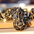 Metal hollow dice set with various animal patterns such as Snakes, Eagles, Wolves, and Octopuses, Suitable for Dungeons&Dragons (DND) product logo