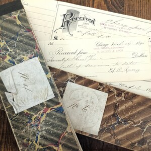 May include: A close-up of three vintage receipts with marbled paper covers. The receipts are dated June 7, 1890, March 29, 1890, and May 3, 1820. The text on the receipts reads "Received from" and "in full of account to date".