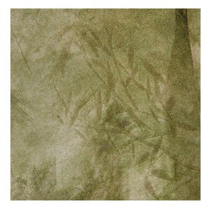 May include: Close-up of a textured fabric with a repeating leaf pattern in shades of olive green and tan. The fabric has a subtle sheen and a slightly mottled appearance, suggesting a natural fiber material.