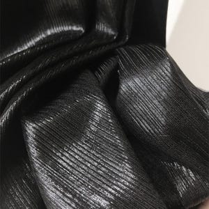 Reflekterande folieborstat stickat tyg, stretchigt metalliskt tyg för tränings- och fritidskläder