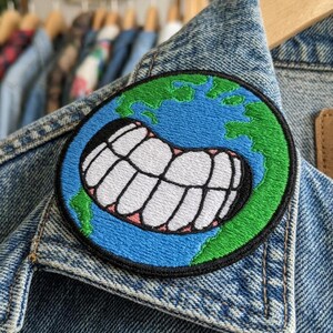 Smiling Earth Embroidered Patch, Funny World Globe Iron On, Creepy Smile Planet Applique for Jackets, Weird Core Aesthetic, Cool Satire Gift