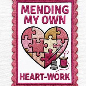 May include: Embroidered patch with a pink scalloped border and the words "MENDING MY OWN HEART-WORK." The design features a heart-shaped puzzle with a needle, thimble, and spool of thread.
