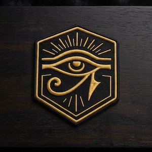 May include: A white ceramic mug with a black handle and the text "But First, Coffee" in a black, bold font. The mug is on a white surface.