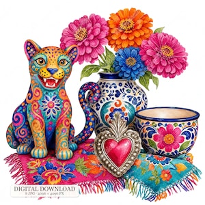 May include: A colorful jaguar figurine with intricate patterns sits beside a ceramic vase filled with pink, orange, and blue flowers. A heart-shaped metal ornament and a patterned bowl rest on two fringed fabric mats with floral designs.
